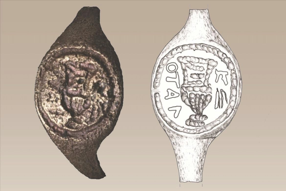 Ancient copper signet ring with engraved Greek letters and a pottery vessel, left, next to a drawing of the ring.
